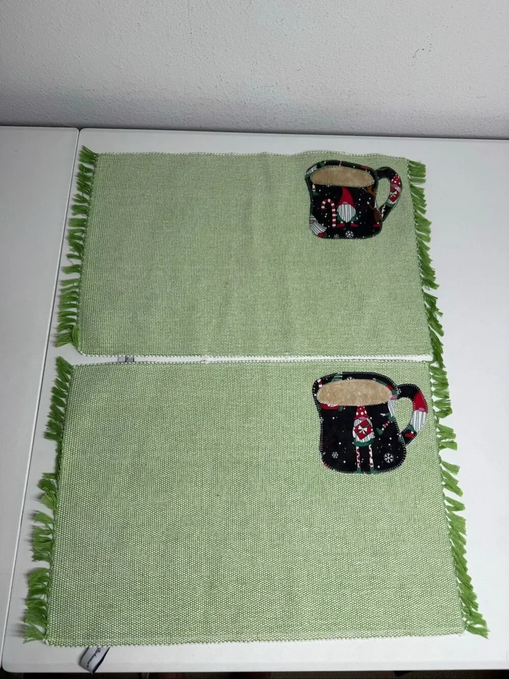 Rare Tommy Bahama Christmas Gnome Mug Placemats Set of 2 Green Fringe Table Mats